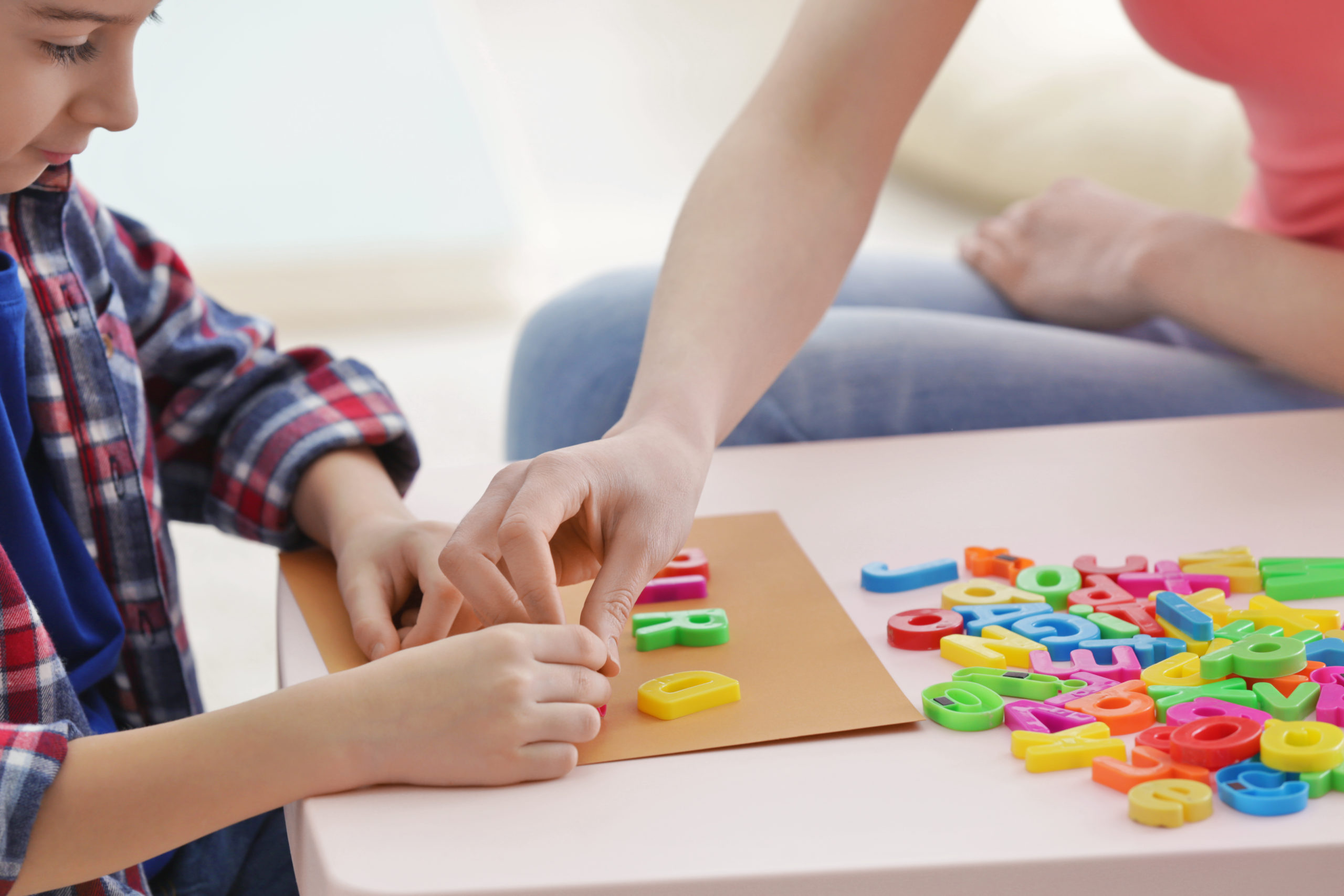 Cute little boy at speech therapist office